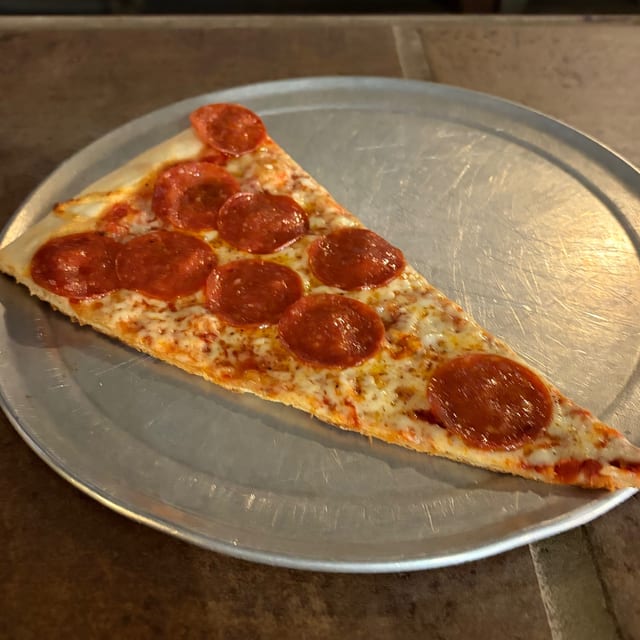 Pizza by The Slice - 1 Topping.